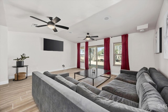 7544 Clifford Ct, Bakersfield, CA 93313 - living room with ceiling fan, vaulted ceiling, light wood-style flooring, and baseboards