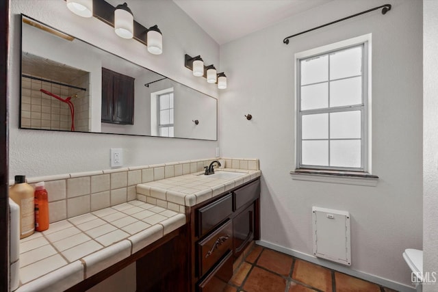 7544 Clifford Ct, Bakersfield, CA 93313 - full bathroom featuring vanity, toilet, baseboards, tasteful backsplash, and a shower