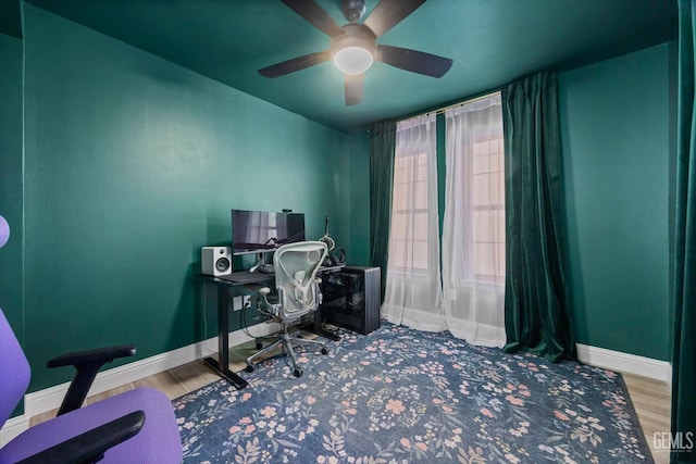 7544 Clifford Ct, Bakersfield, CA 93313 - home office with baseboards, wood finished floors, and a ceiling fan