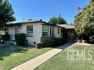 3100 18th St, Bakersfield, CA 93301 - view of front of home with a front lawn