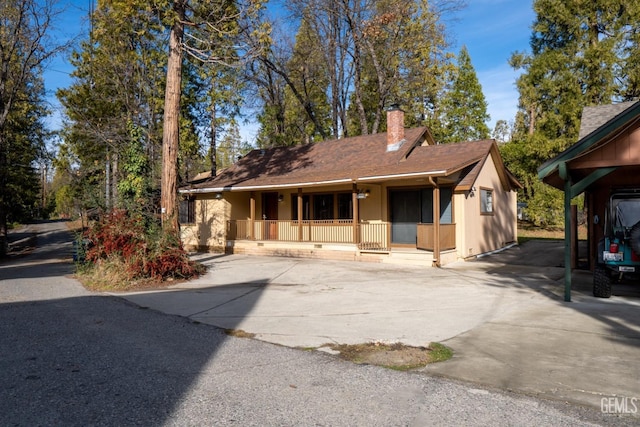 view of front of home featuring covered porch