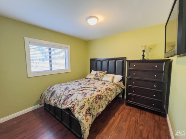 bedroom featuring dark hardwood / wood-style floors