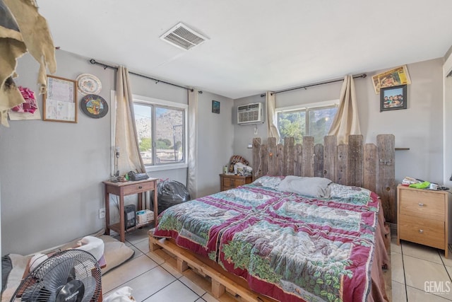 7958 Harmony Ln, Onyx, CA 93255 - bedroom featuring light tile patterned floors, multiple windows, and a wall mounted AC