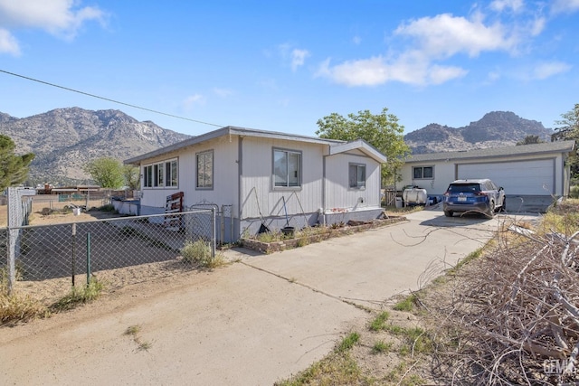 7958 Harmony Ln, Onyx, CA 93255 - view of front of property featuring a mountain view, driveway, and fence