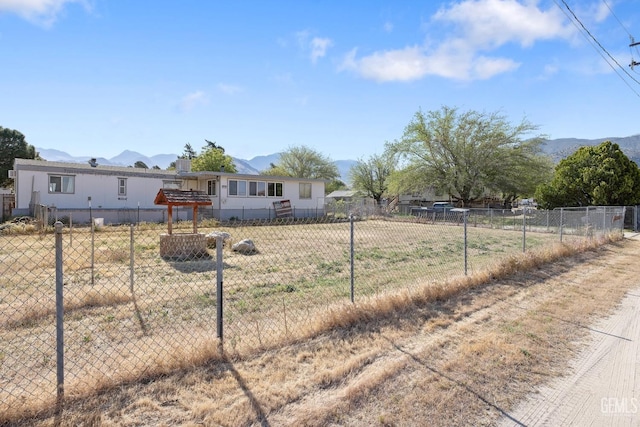 7958 Harmony Ln, Onyx, CA 93255 - manufactured / mobile home with a mountain view and fence