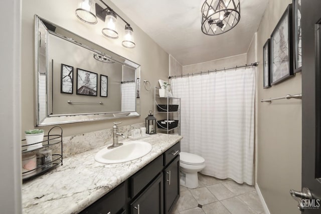 full bathroom with a shower with shower curtain, tile patterned flooring, vanity, and toilet