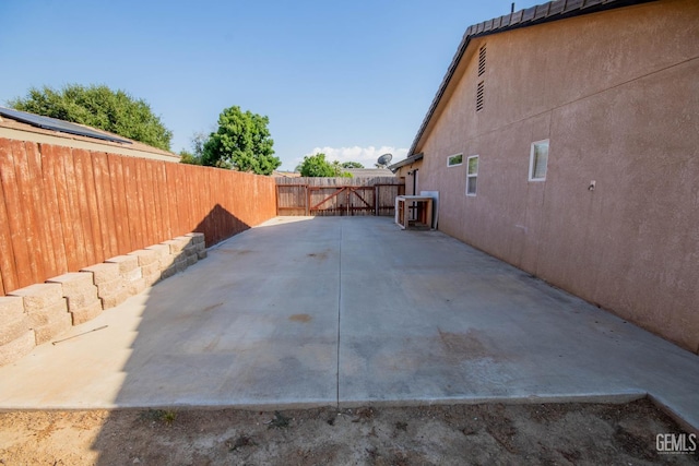 5514 Lombardy Ct, Bakersfield, CA 93308 - fenced backyard featuring a patio area and a gate