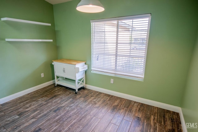 5514 Lombardy Ct, Bakersfield, CA 93308 - empty room featuring baseboards and dark wood-type flooring