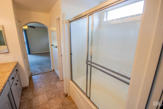 5514 Lombardy Ct, Bakersfield, CA 93308 - full bath with vanity, shower / bath combination with glass door, and baseboards