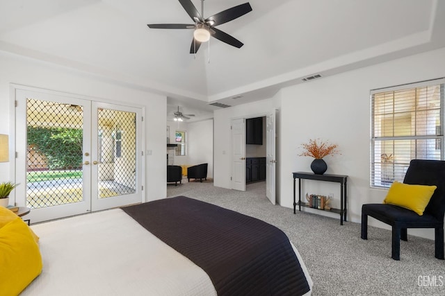 carpeted bedroom featuring visible vents, lofted ceiling, access to exterior, ceiling fan, and french doors