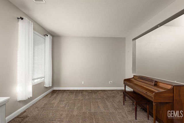 miscellaneous room with carpet