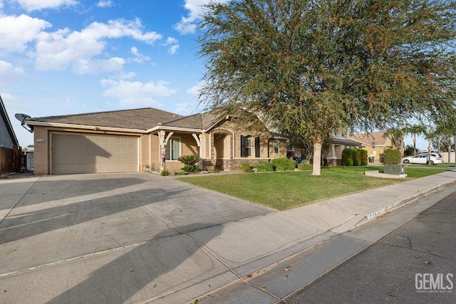 view of front of home with a garage and a front yard