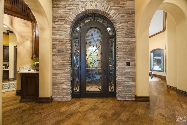 view of exterior entry featuring french doors