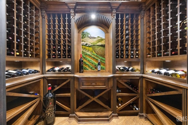 wine cellar featuring light wood-type flooring