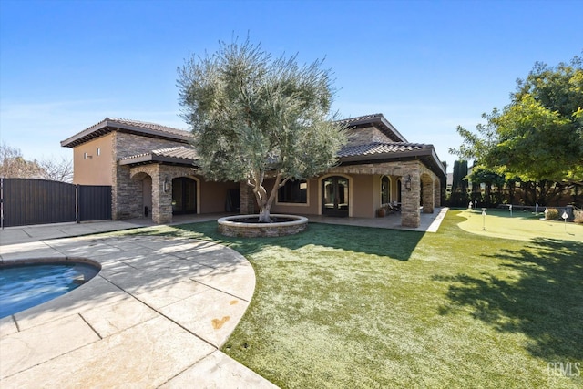 rear view of property with a patio