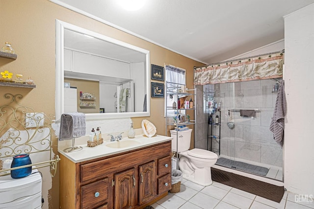 bathroom featuring tile patterned flooring, vanity, a shower with shower curtain, and toilet