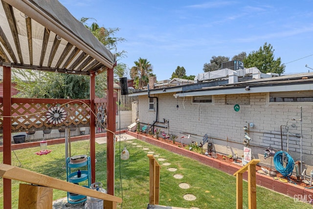 view of yard with central AC unit