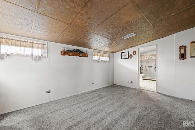 spare room featuring carpet flooring