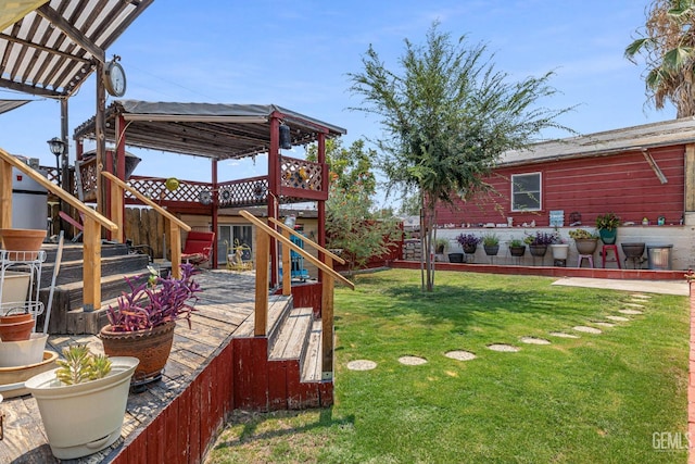 view of yard with a pergola, a patio, and a wooden deck