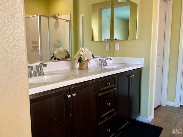 9902 Metropolitan Way, Bakersfield, CA 93311 - full bathroom with double vanity and a shower stall