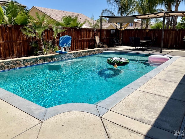 9902 Metropolitan Way, Bakersfield, CA 93311 - view of pool featuring a patio area and a fenced backyard
