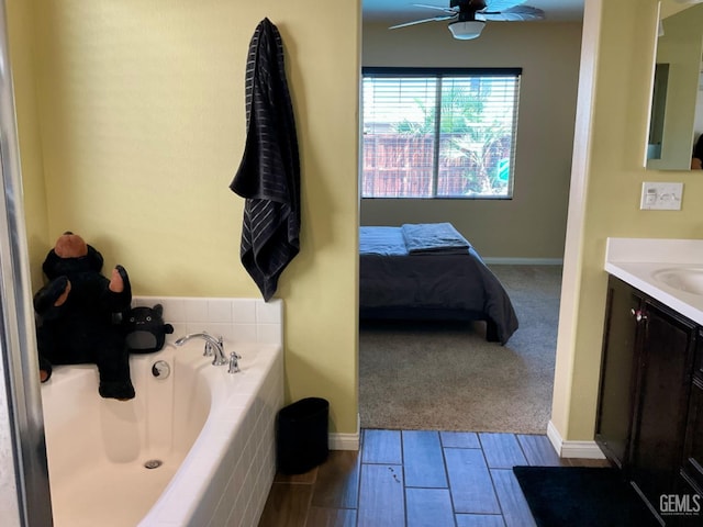 9902 Metropolitan Way, Bakersfield, CA 93311 - full bath featuring vanity, a ceiling fan, a garden tub, and ensuite bathroom