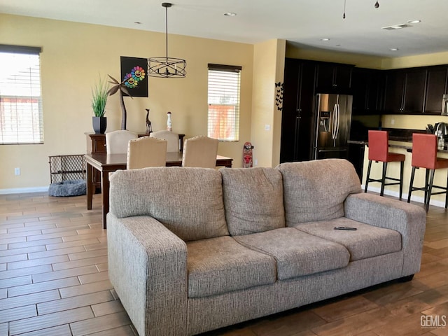 9902 Metropolitan Way, Bakersfield, CA 93311 - living area with light wood-style floors and recessed lighting