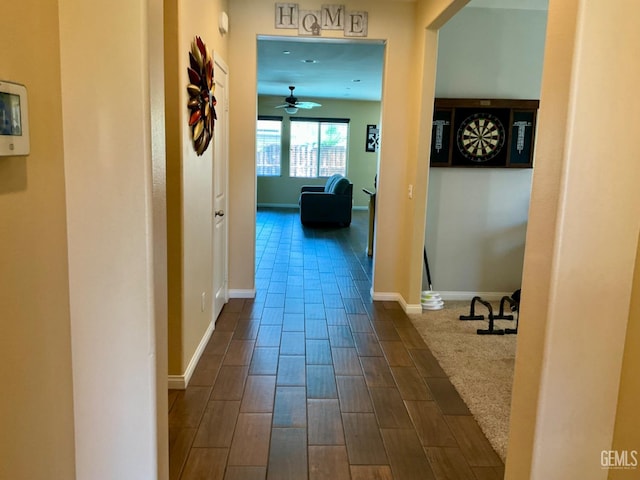 9902 Metropolitan Way, Bakersfield, CA 93311 - hallway with dark wood-style floors and baseboards