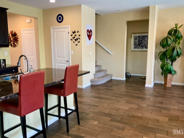 9902 Metropolitan Way, Bakersfield, CA 93311 - dining space with wood finished floors, stairway, and recessed lighting