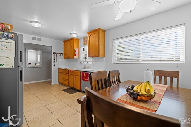 3713 Sechrest Ave, Bakersfield, CA 93309 - dining area featuring ceiling fan and light tile patterned flooring
