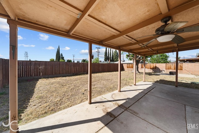 3713 Sechrest Ave, Bakersfield, CA 93309 - fenced backyard with a patio and a ceiling fan