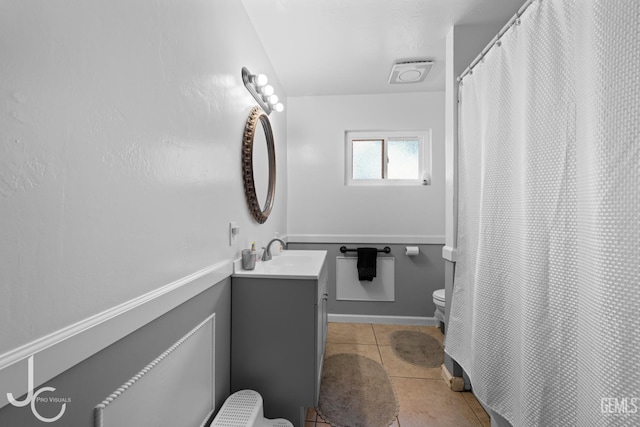 3713 Sechrest Ave, Bakersfield, CA 93309 - bathroom with vanity, tile patterned floors, and a shower with curtain
