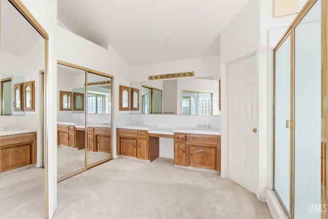 bathroom featuring a shower stall, a garden tub, and a fireplace