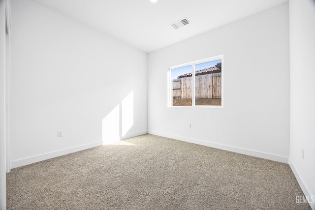 12914 Altair Ct, Bakersfield, CA 93314 - carpeted empty room featuring visible vents and baseboards