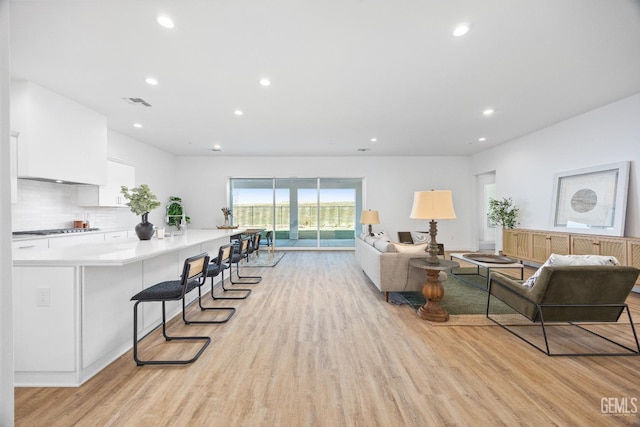 12914 Altair Ct, Bakersfield, CA 93314 - living area with recessed lighting, visible vents, and light wood-type flooring