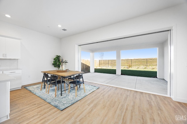 12914 Altair Ct, Bakersfield, CA 93314 - dining space with visible vents, light wood-style flooring, recessed lighting, and baseboards