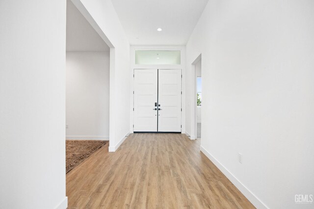 12914 Altair Ct, Bakersfield, CA 93314 - foyer entrance with baseboards and light wood-style floors