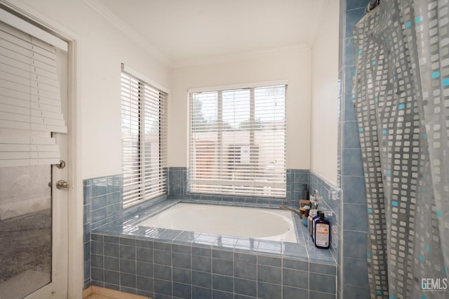 bathroom featuring tiled bath and ornamental molding