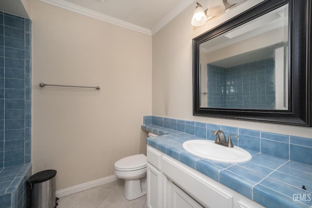 bathroom with tile patterned floors, crown molding, vanity, and toilet