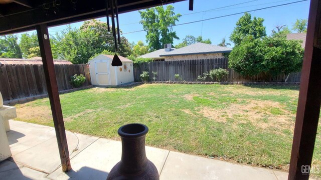 2617 4th St, Bakersfield, CA 93304 - fenced backyard with a shed and a patio