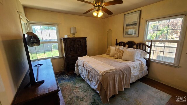 2617 4th St, Bakersfield, CA 93304 - bedroom featuring dark wood-style floors and a ceiling fan