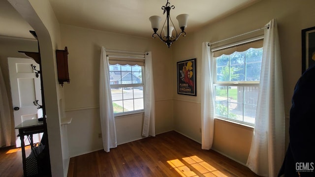 2617 4th St, Bakersfield, CA 93304 - entryway with wood finished floors, plenty of natural light, and a chandelier