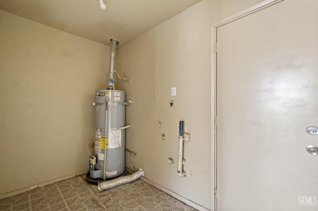 utility room with gas water heater