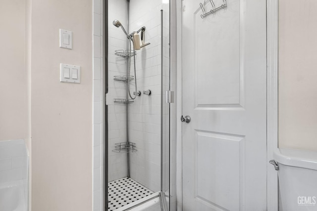 3025 19th St, Bakersfield, CA 93301 - bathroom featuring a shower stall and toilet