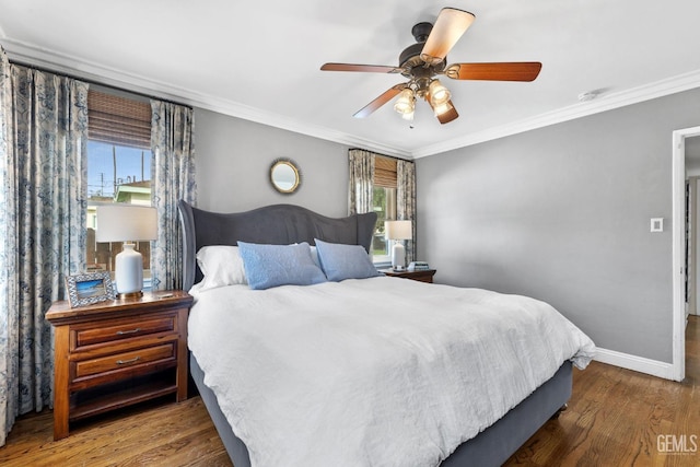 3025 19th St, Bakersfield, CA 93301 - bedroom featuring wood finished floors, multiple windows, and crown molding
