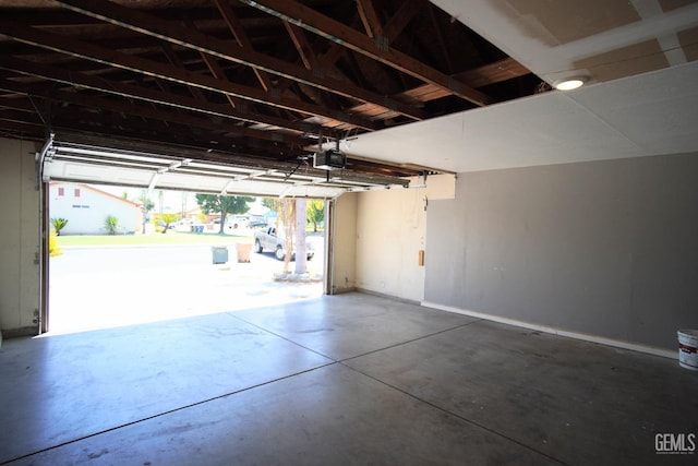 garage featuring a garage door opener