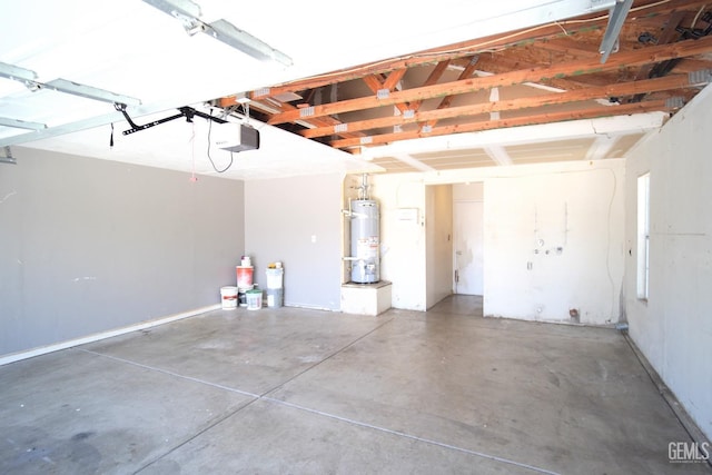 garage with secured water heater and a garage door opener