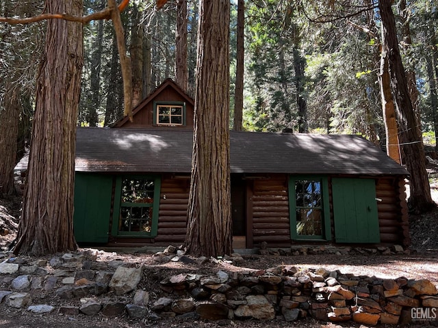 9525 Shirley Meadows Rd Unit 6, Wofford Heights, CA 93285 - view of front of home with log siding and roof with shingles
