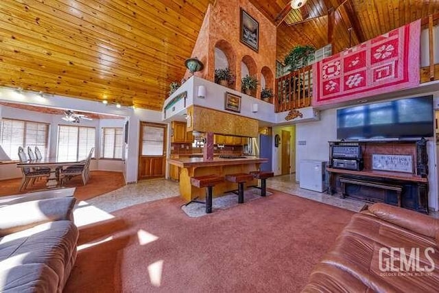 game room featuring high vaulted ceiling, light colored carpet, wood ceiling, and ceiling fan