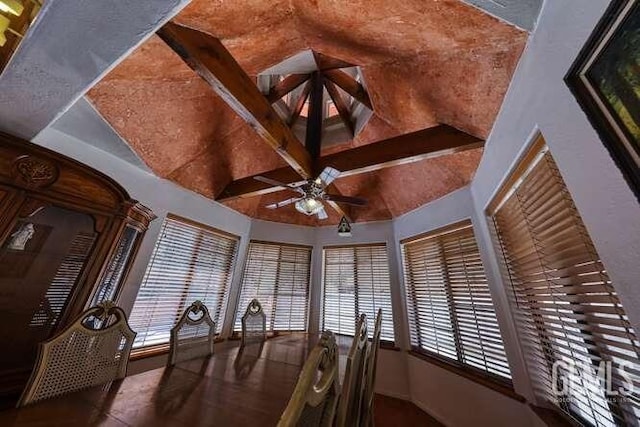 unfurnished dining area with a ceiling fan